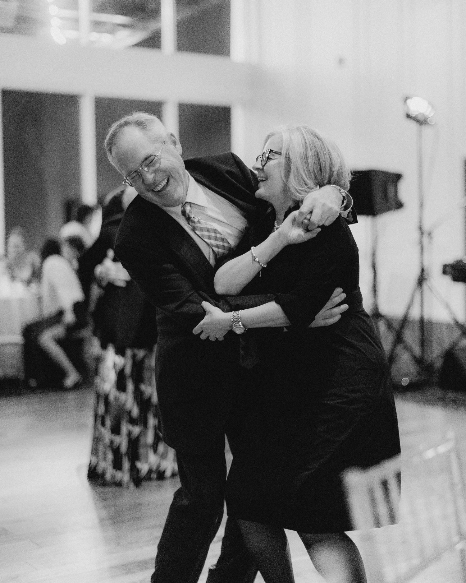 Black and white dance photos showing couples in flowing movement.