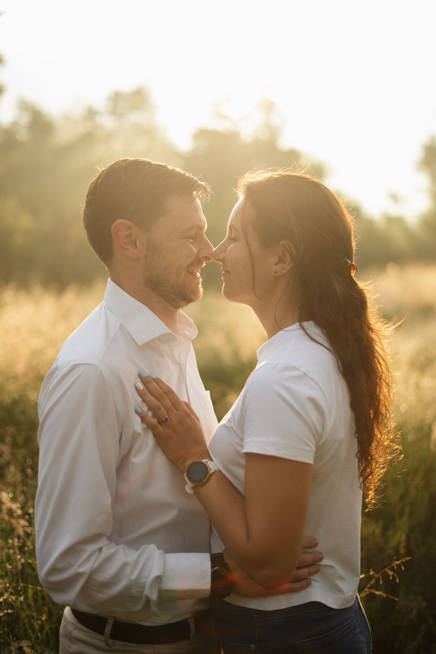 A couple on their engagement shoot, photo taken by Jordie Captures