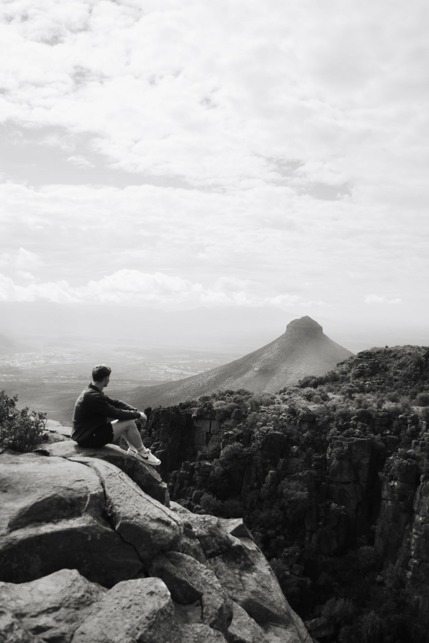 Photo of the photographer of Jordie Captures in front of a mountain