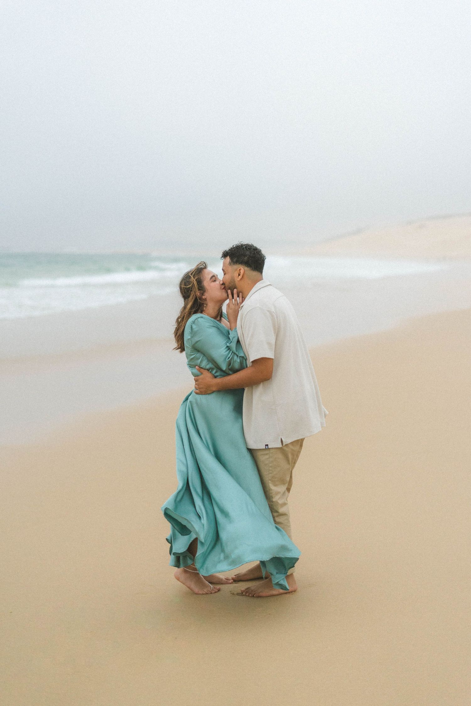 A couple on their engagement shoot, photo taken by Jordie Captures