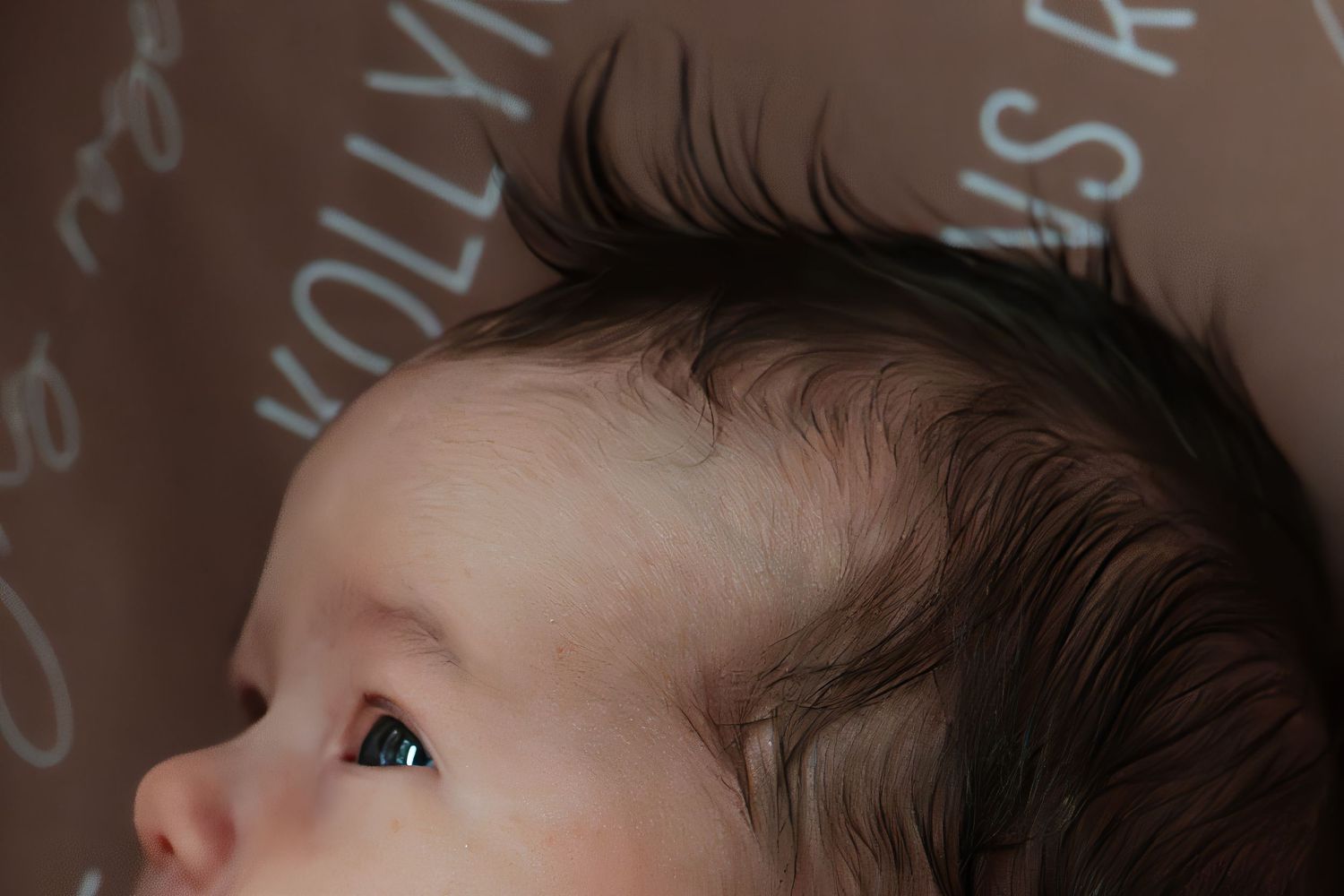 Close-up macro shot of a sleeping baby's face.