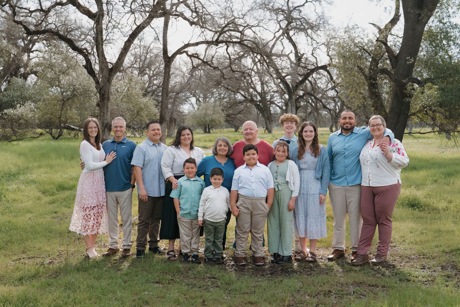 A series of coordinated group photos taken outdoors with people wearing casual attire in a natural setting.