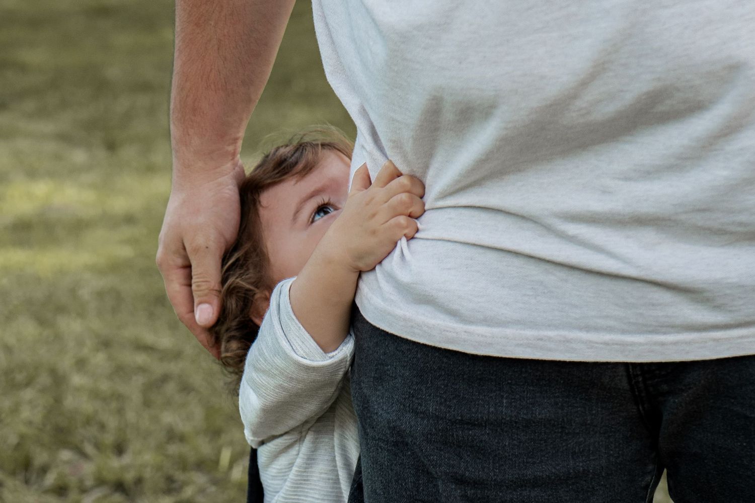Casual white shirt detail during outdoor family photography session in Roseville, CA