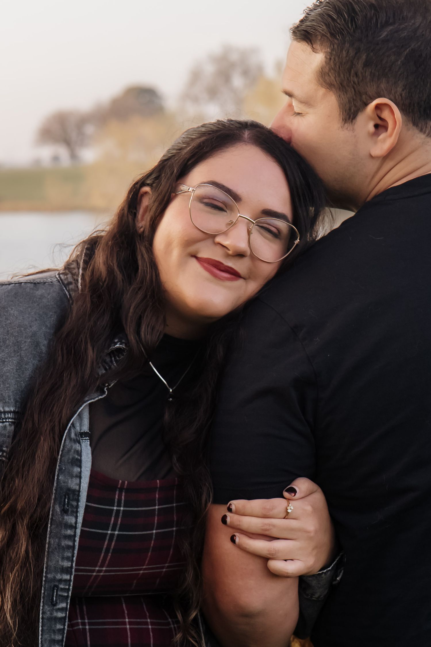 Close-up shots of tender moments between a couple wearing casual attire in Roseville, CA