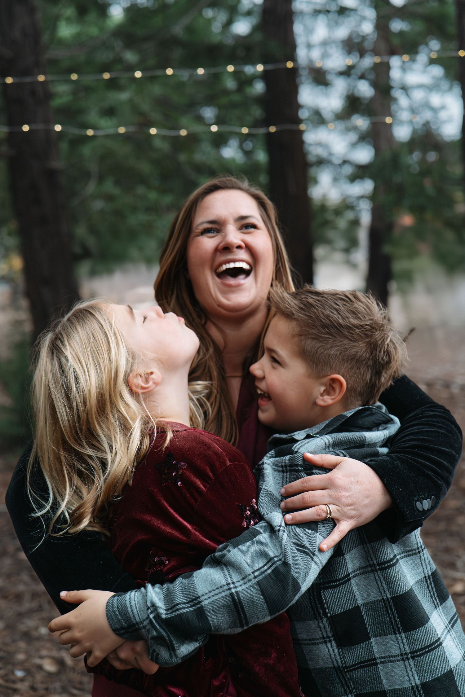 Joyful outdoor family photoshoot showing playful interactions and laughter among loved ones in Roseville, CA