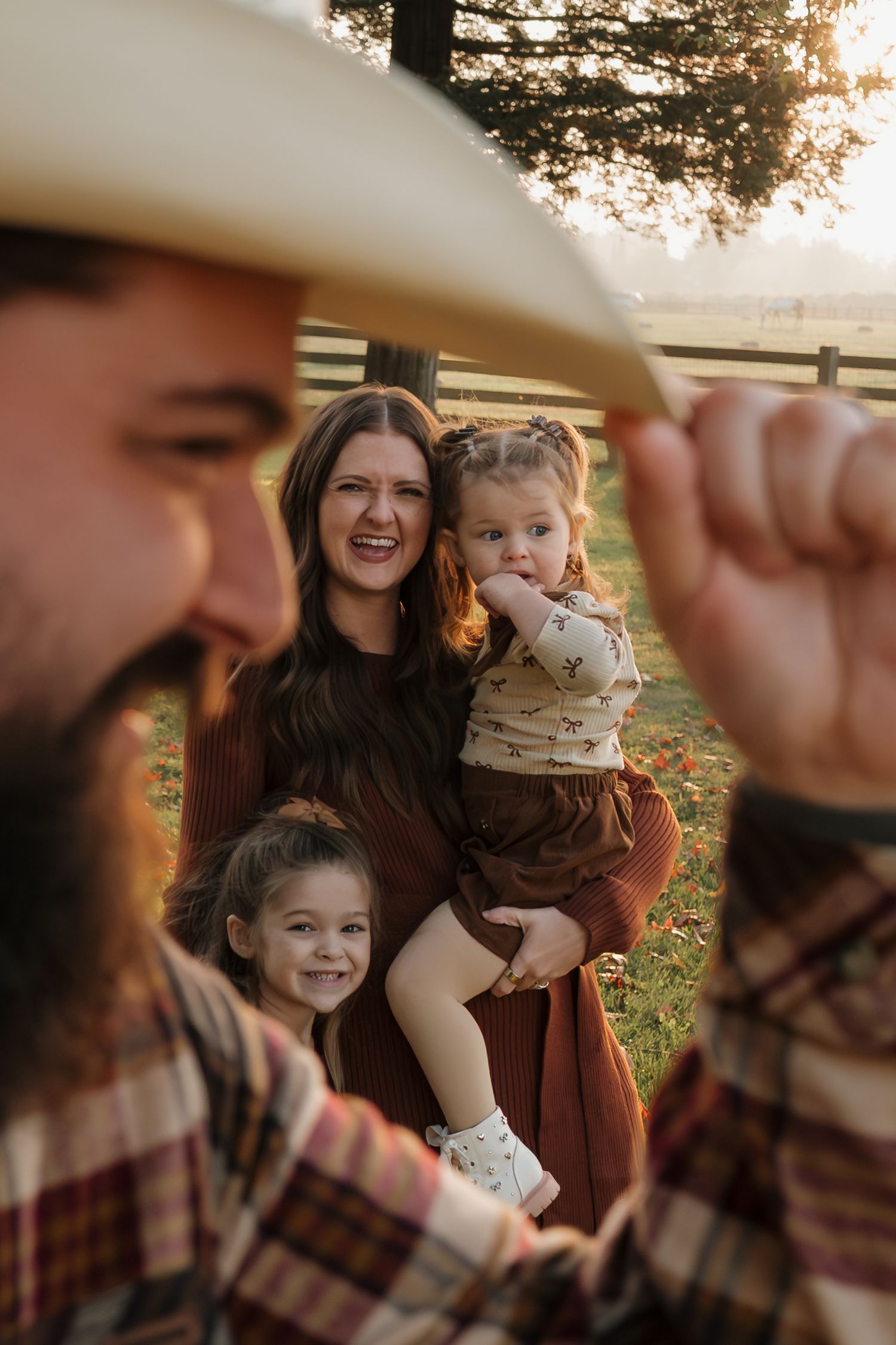 Family sharing joyful moments together in an outdoor autumn setting in Roseville, CA