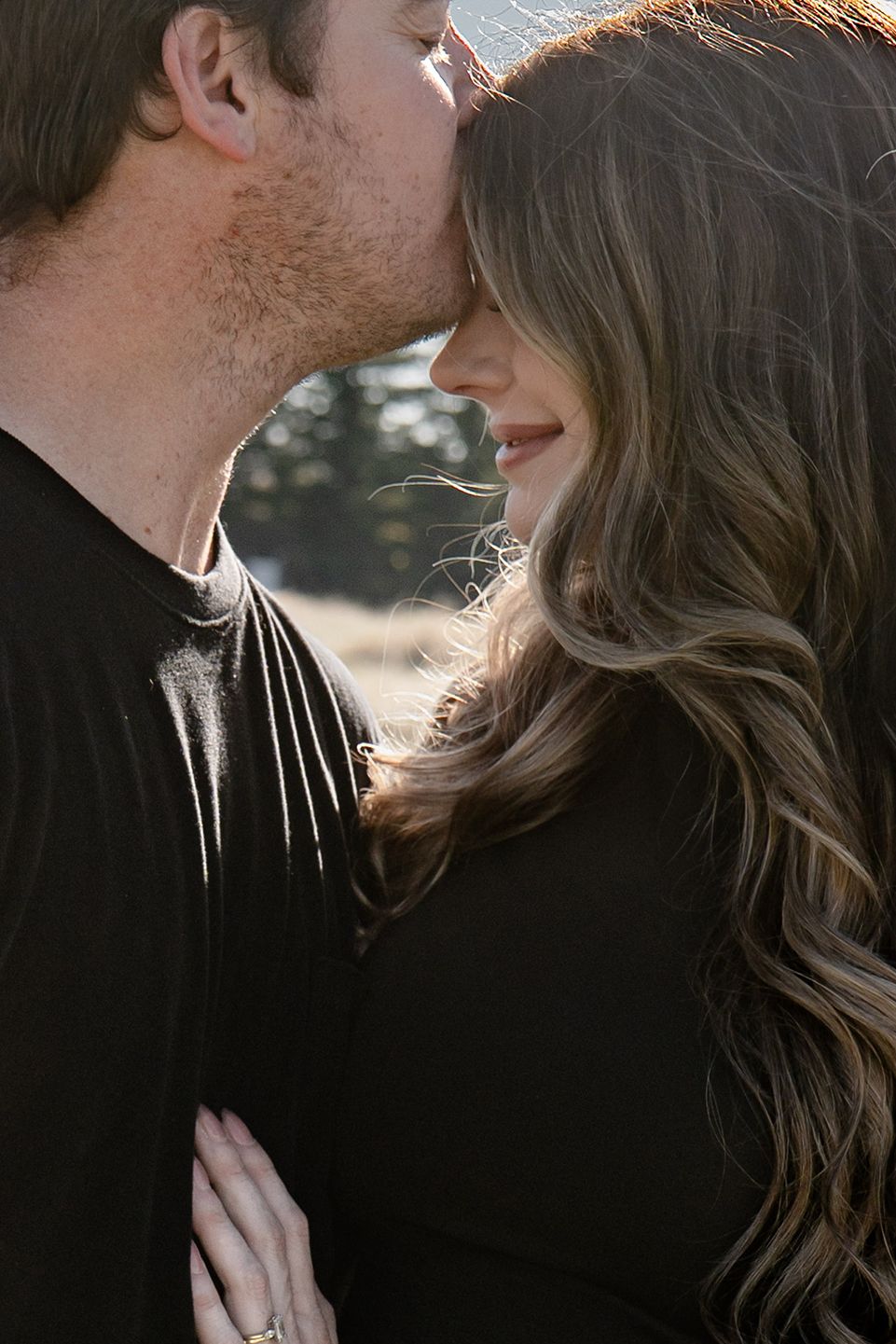 Intimate couple sharing romantic moments in black and white close-up shots in Roseville, CA