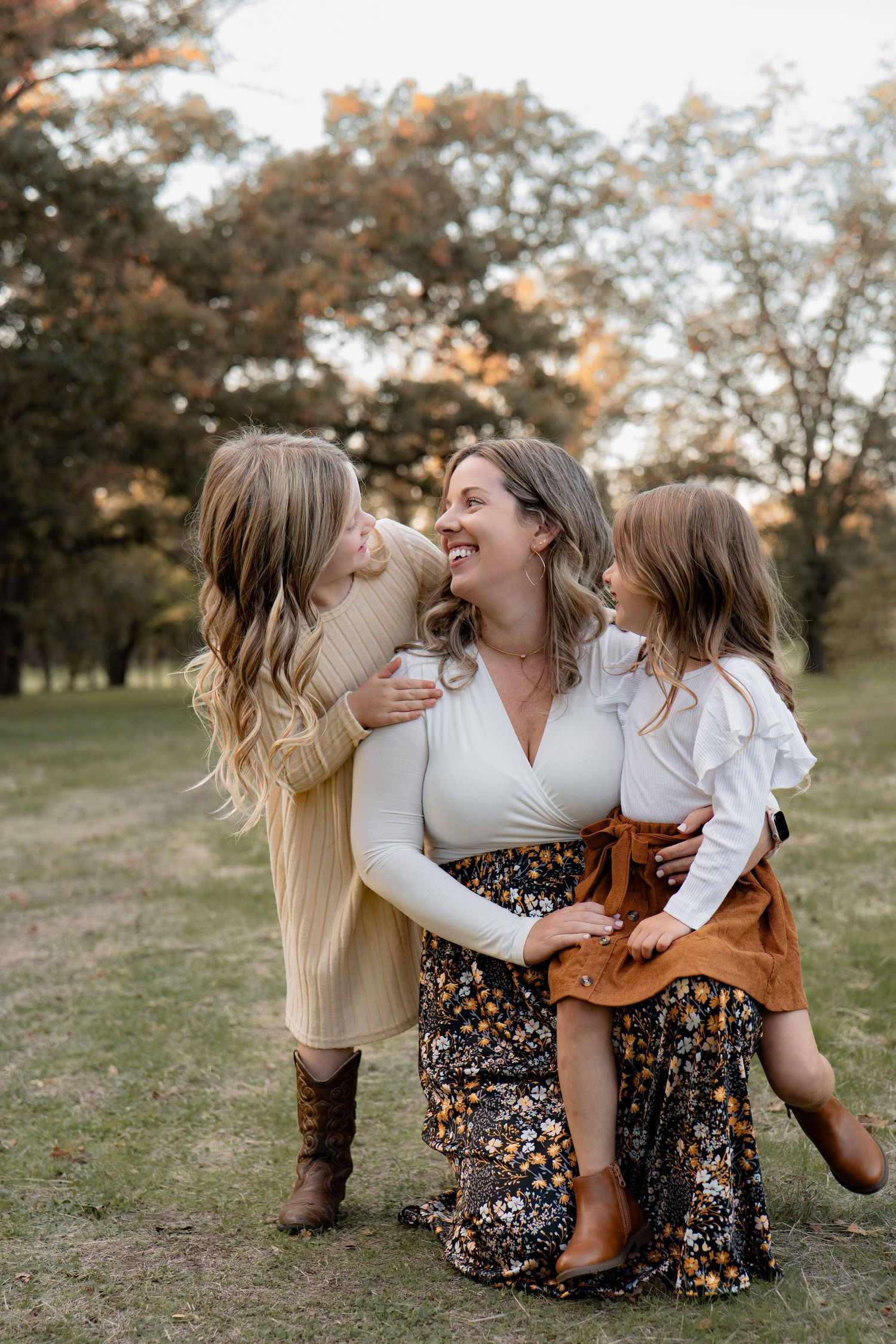 Joyful family moment captured outdoors with matching fall outfits in Roseville, CA