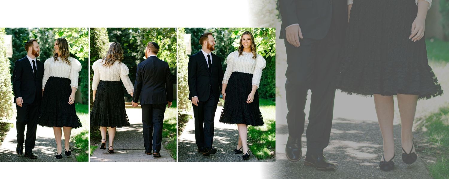 A couple in formal attire poses for engagement photos in a lush garden setting.