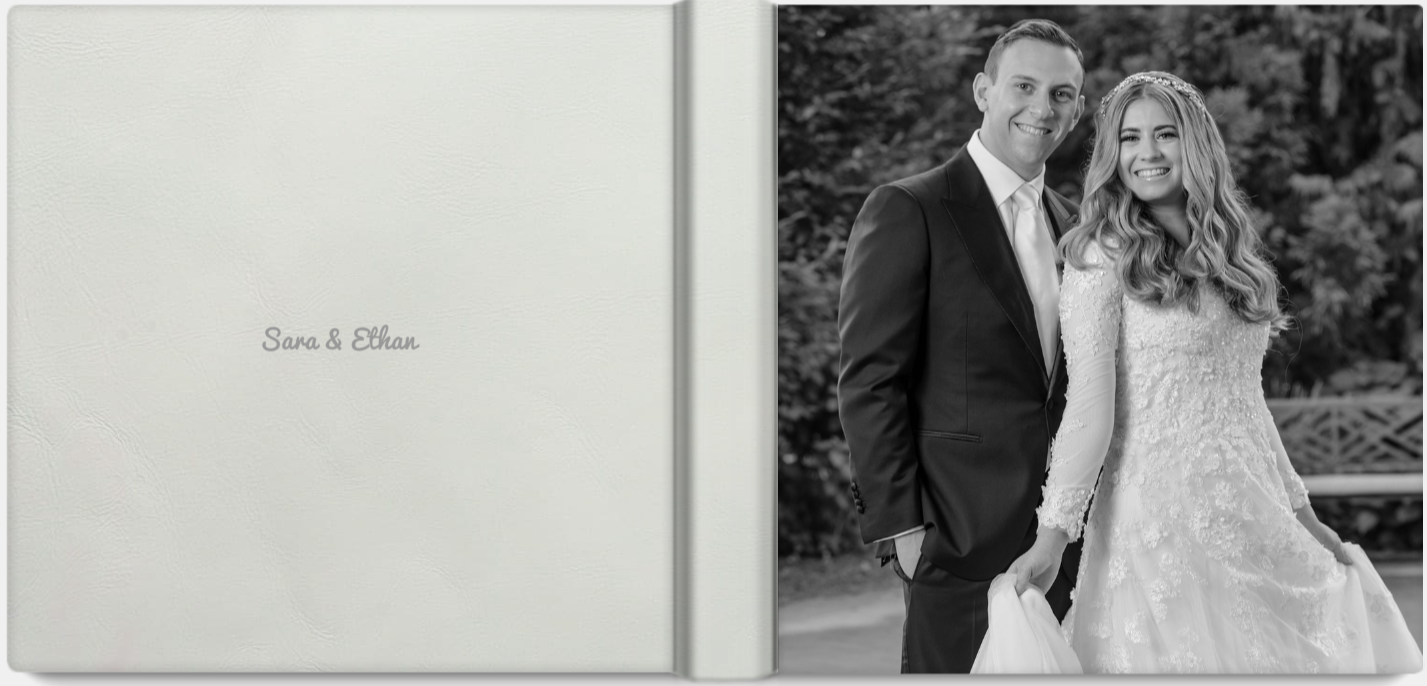 A romantic wedding couple shares an intimate moment together in a garden setting