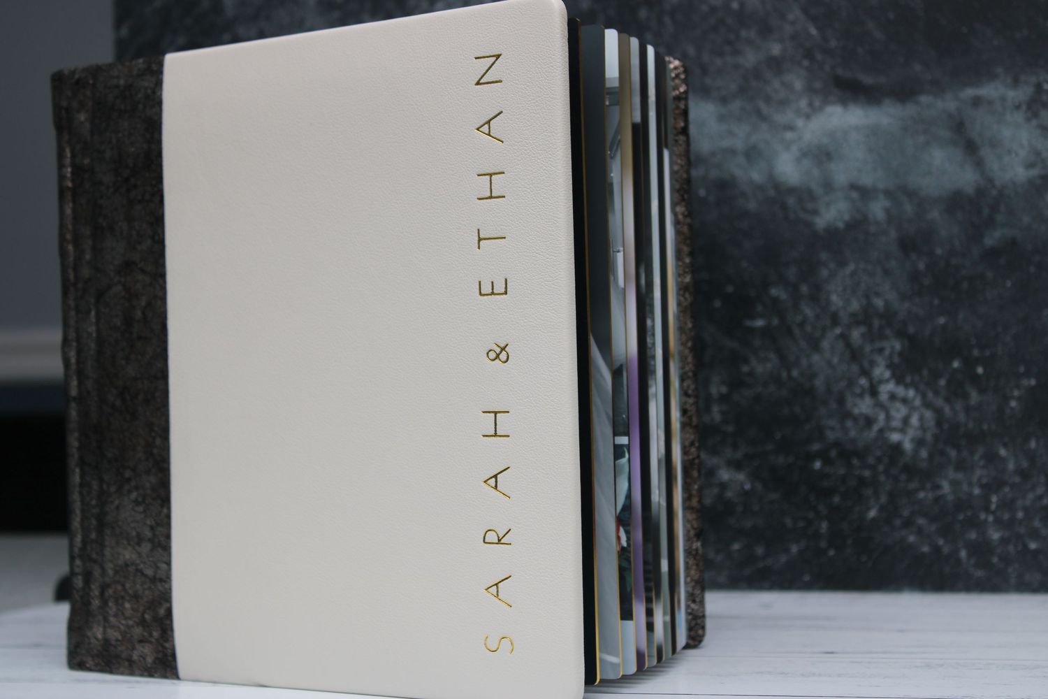 Leather photo album featuring sleek modern text design, blending classic craftsmanship with contemporary style.