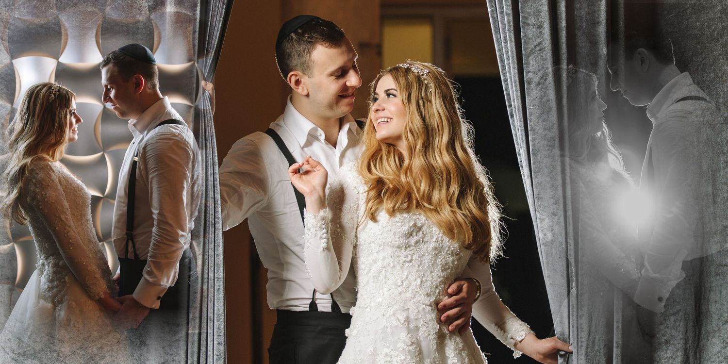 Bride and groom after their wedding reception posing for the photographer, capturing a joyful moment together.