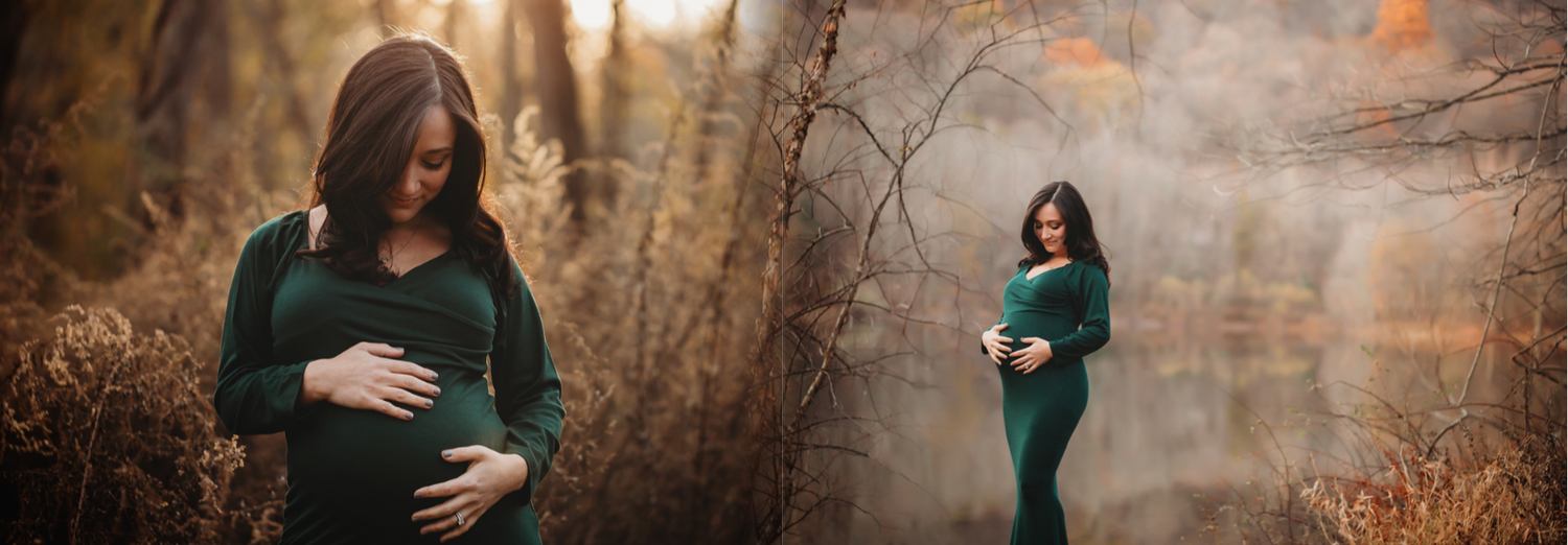 A woman in an emerald dress poses in a misty autumn forest during a maternity photo session.