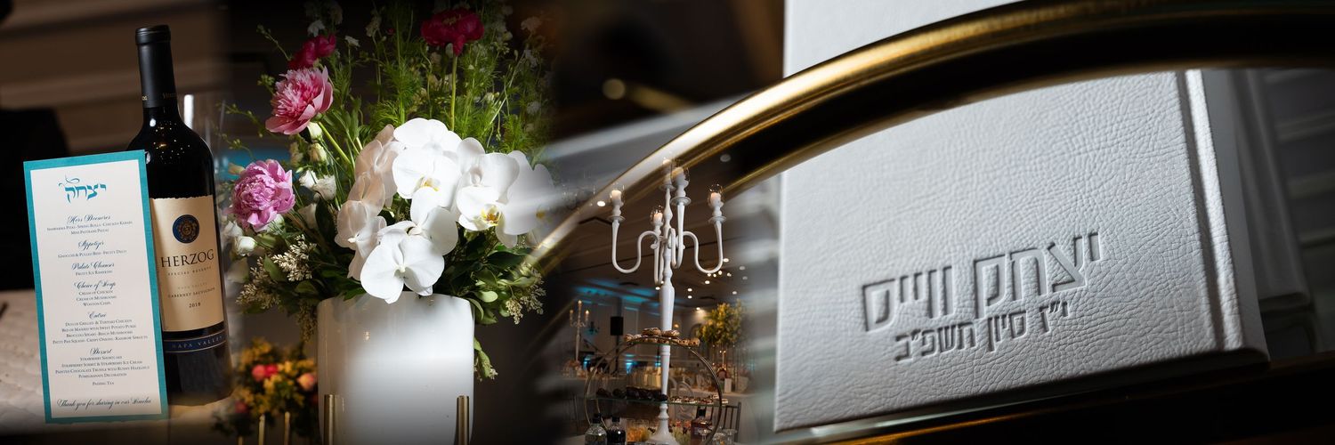 Bar mitzvah event décor with a bottle of wine and flowers in the background, symbolizing celebration and tradition.