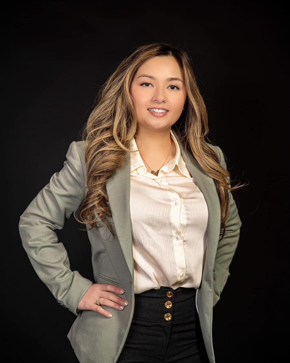 Photograhy, photographer, Mobile, AL  Professional headshot with sage blazer, white blouse and styled hair against dark background.