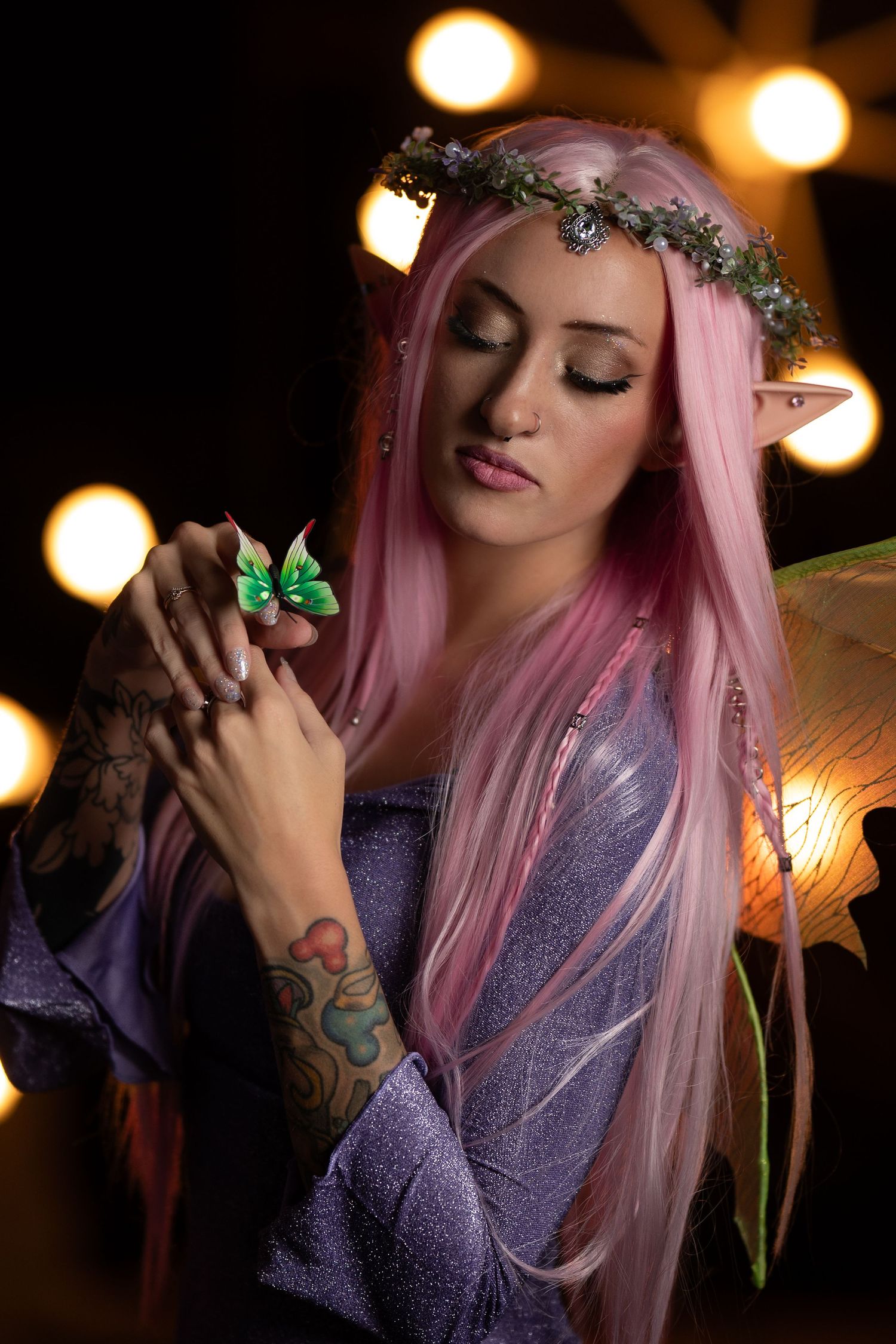 Fantasy portrait with pink hair, flower crown, and ethereal lighting effects.