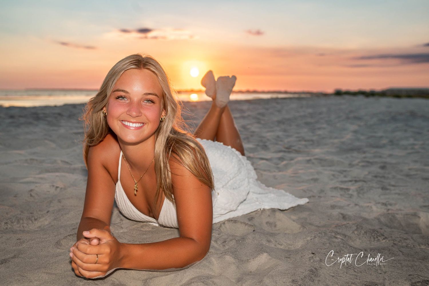 Photograhy, photographer, Mobile, AL  Beach photography with sunset lighting and white dress on sandy shore.