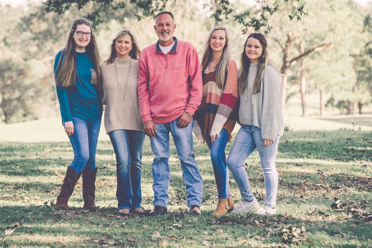 Photograhy, photographer, Mobile, AL  Casual family portrait outdoors in fall with matching sweaters and jeans.