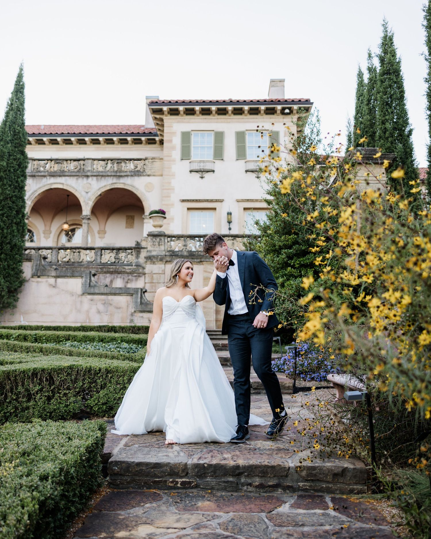 Hayley Paige wedding dress at Philbrook Museum Tulsa — bride in gorgeous gown standing among the Italian gardens of this iconic OK venue