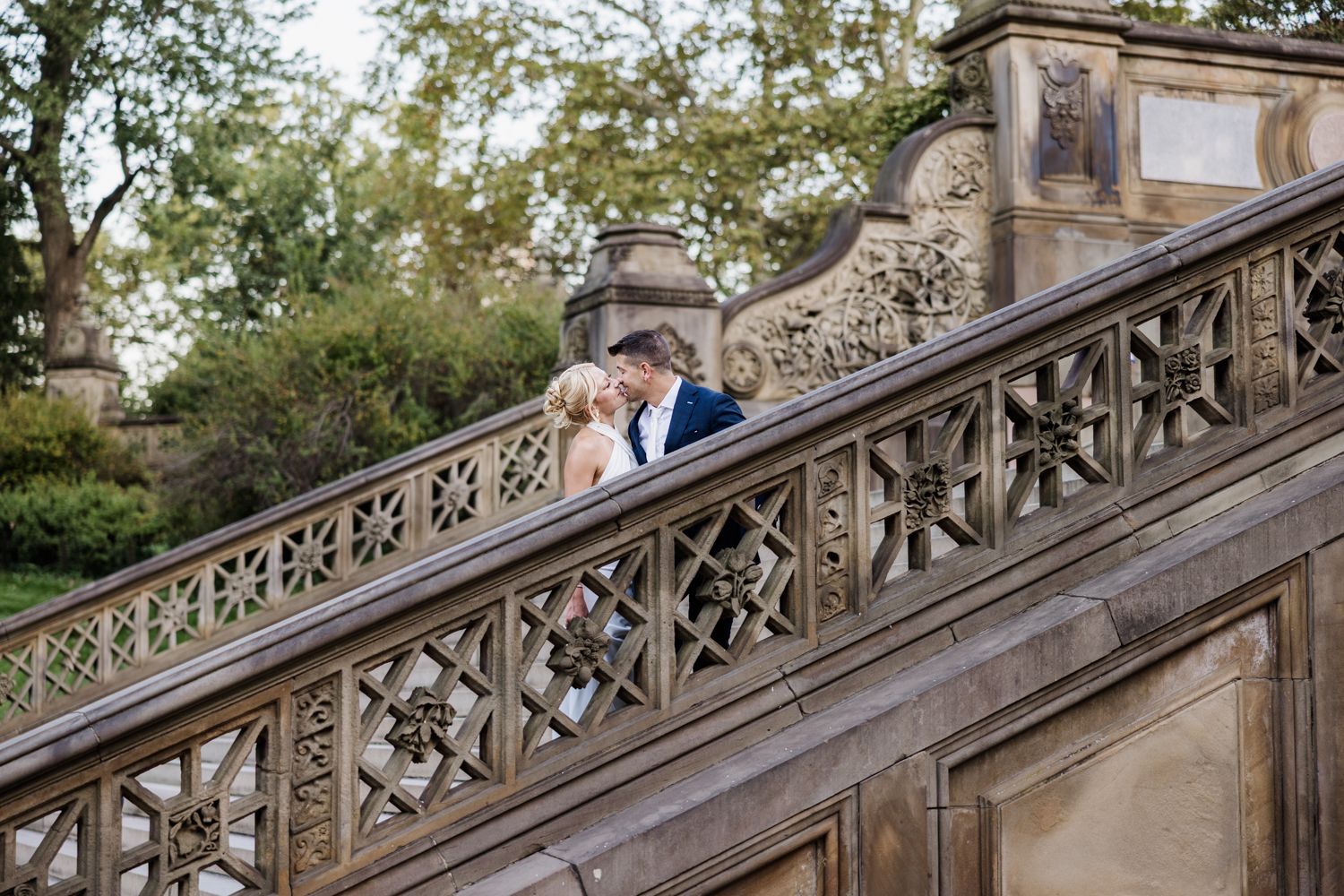 Romantic Central Park elopement NYC. Couple sharing intimate moment in the fall in the heart of Manhattan. Elopement and Wedding.