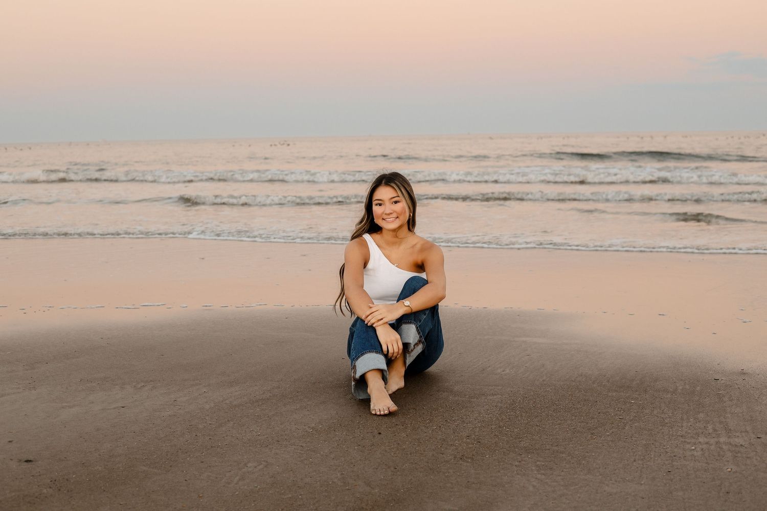 A series of beach photos at sunset showing someone sitting and walking along the shoreline.