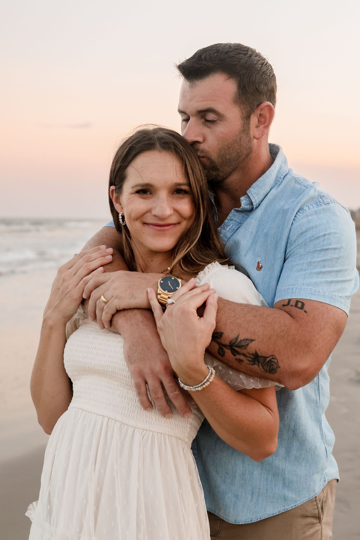 Romantic couple embraces on beach at sunset in series of intimate photos showing tender affection and love.