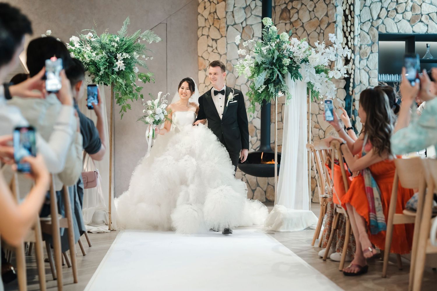 A montage of wedding ceremony moments showing decor, dancing, and celebrations at an elegant coastal venue.