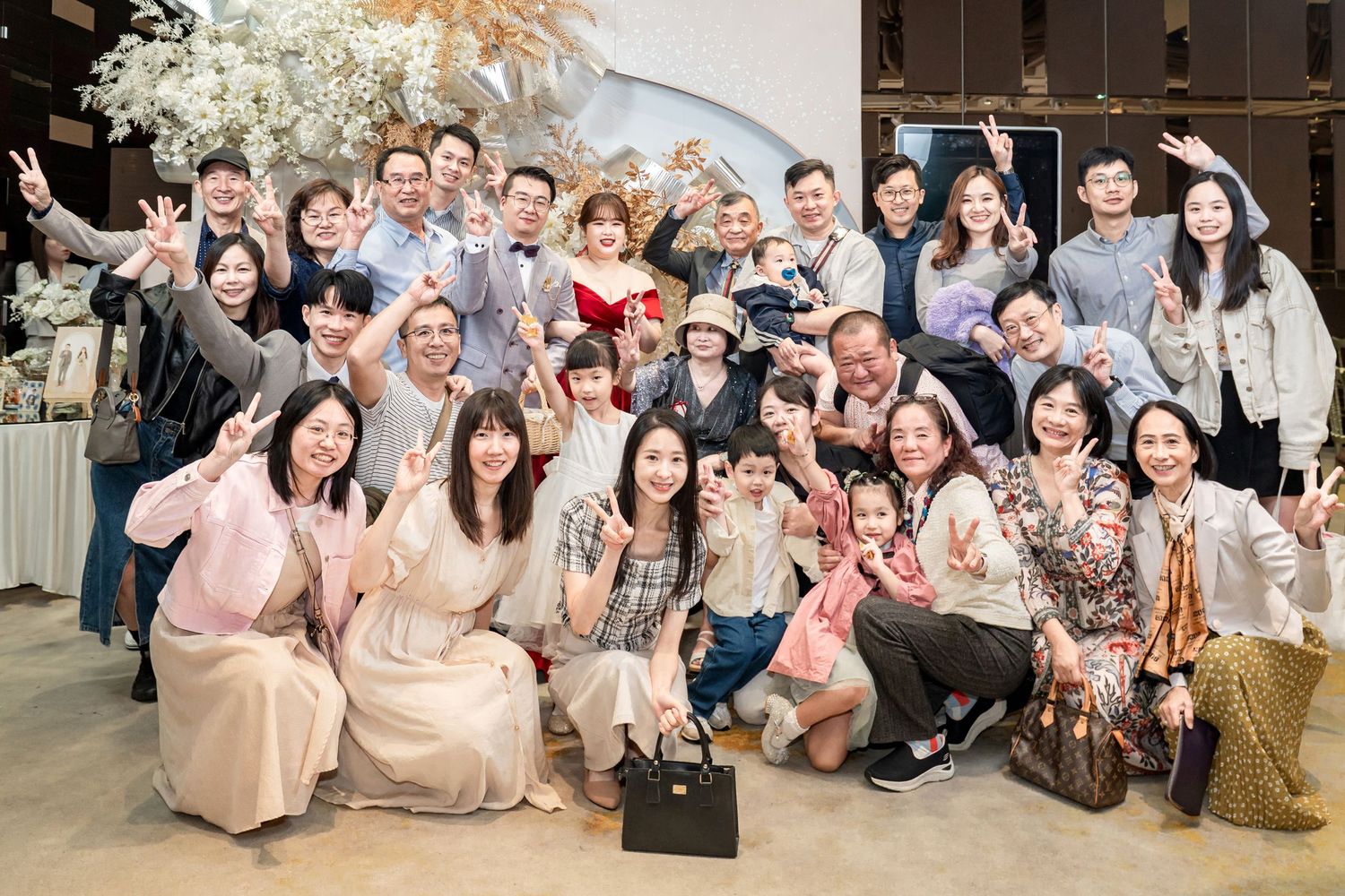 A group of people gathered together in a series of casual indoor and outdoor social gatherings and group photos.