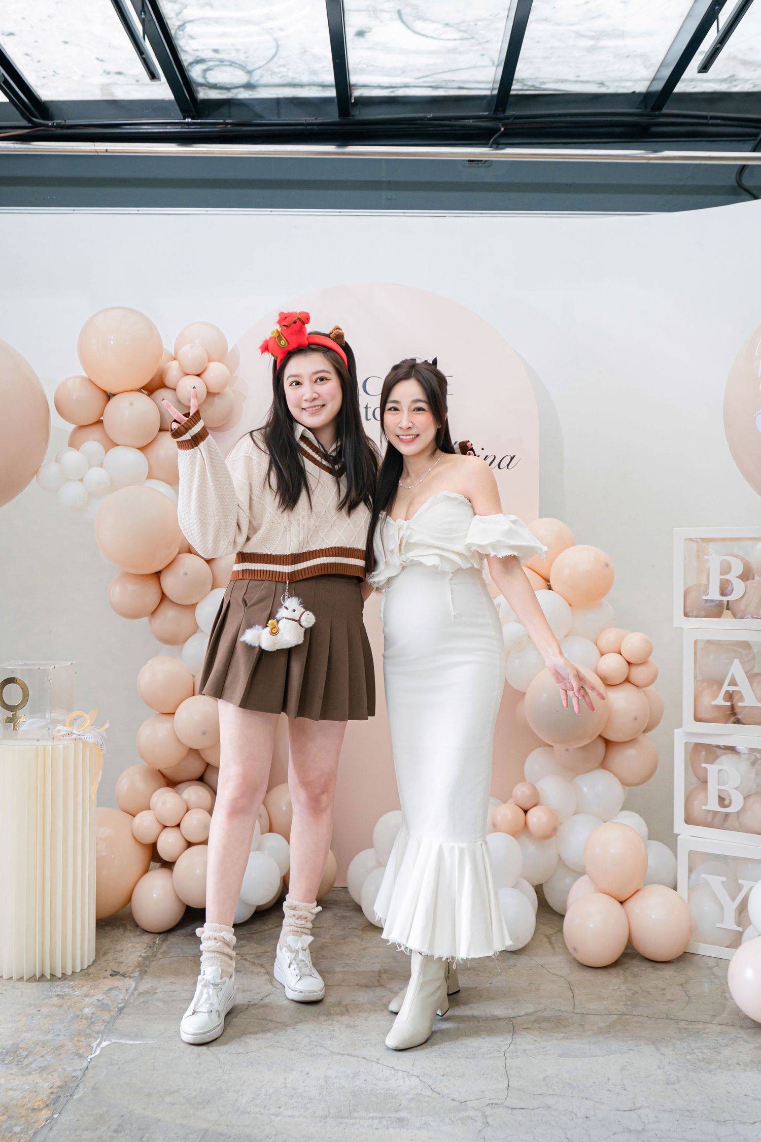 Three cropped photos showing white dresses and sneakers against a backdrop of peach-colored balloon decorations.