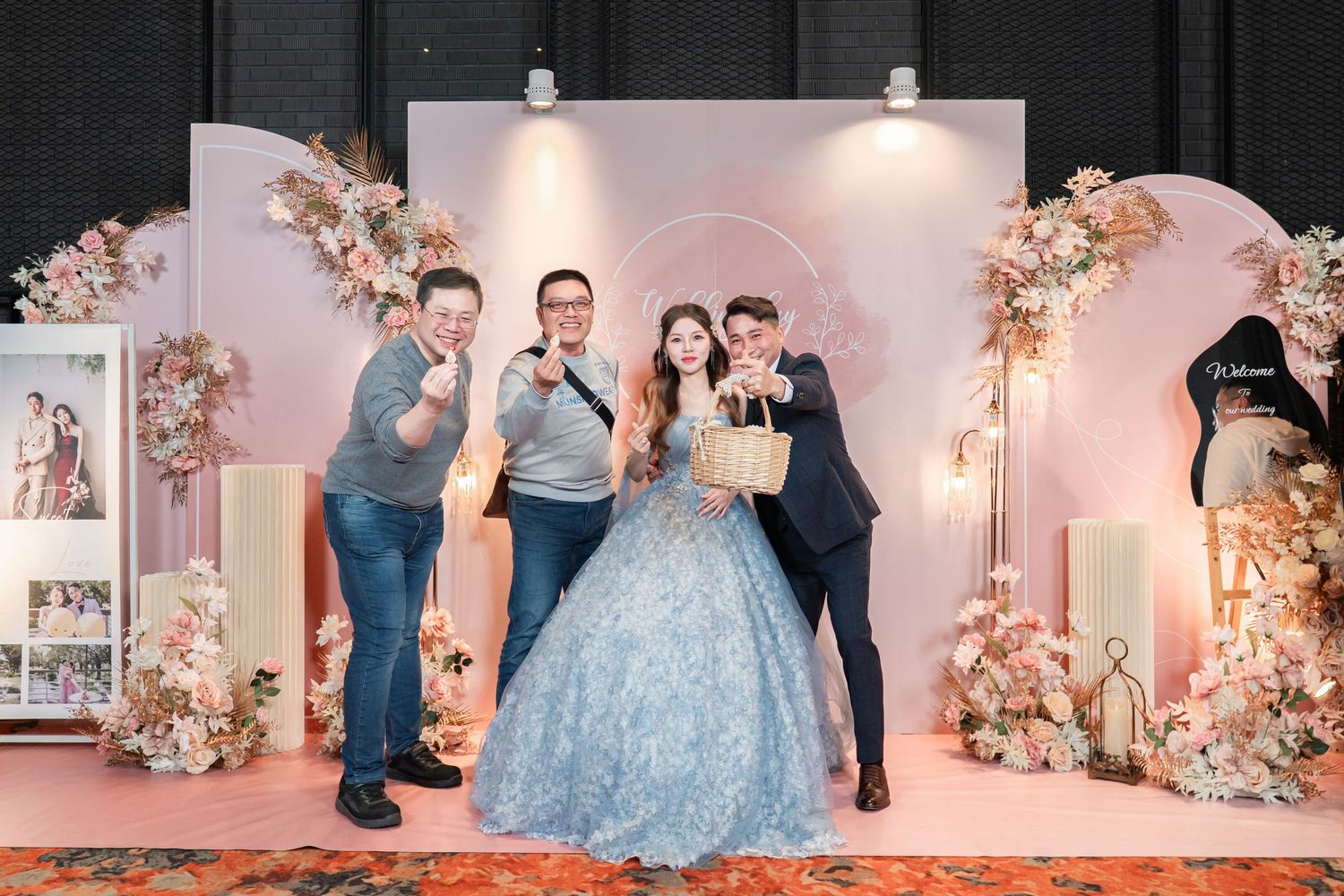 A series of wedding celebration photos featuring a light blue ballgown in an elegant venue decorated with pink florals.