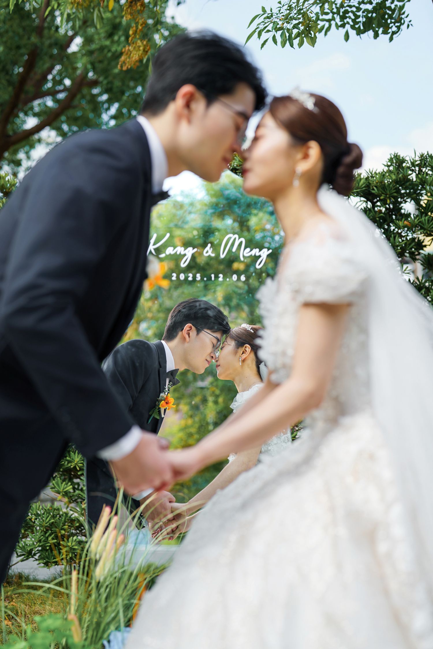 Romantic wedding couple sharing tender moments in a lush garden setting with soft natural lighting.