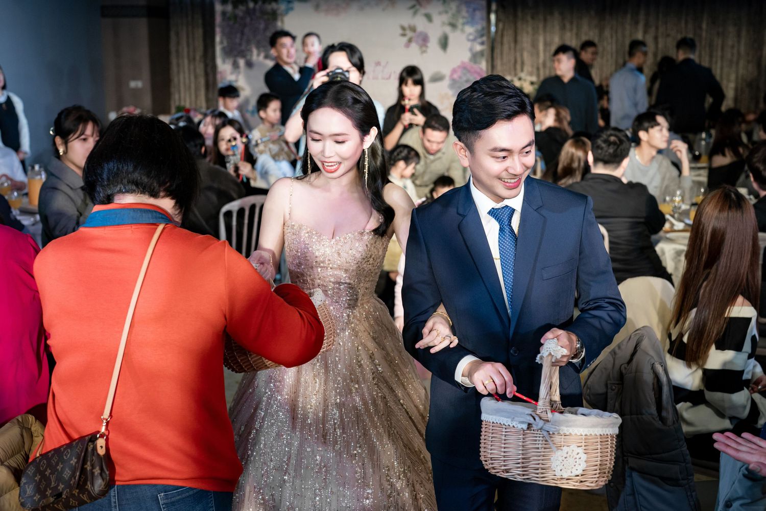 People dancing and socializing at a lively indoor party or celebration event.