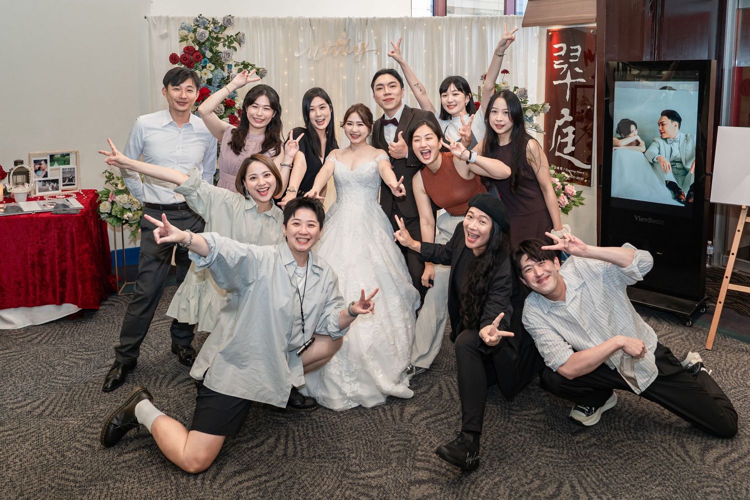 A series of candid wedding party photos showing joyful celebrations and group poses in an indoor venue.