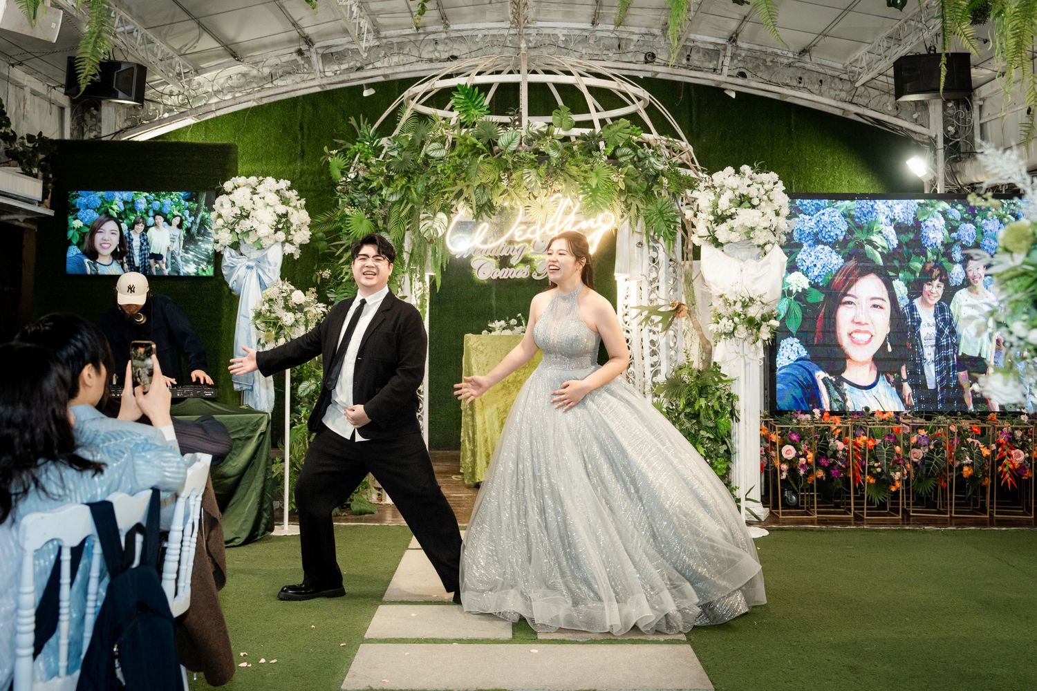 A series of wedding venue photos showing a tented outdoor reception space with floral decor and elegant garden settings.