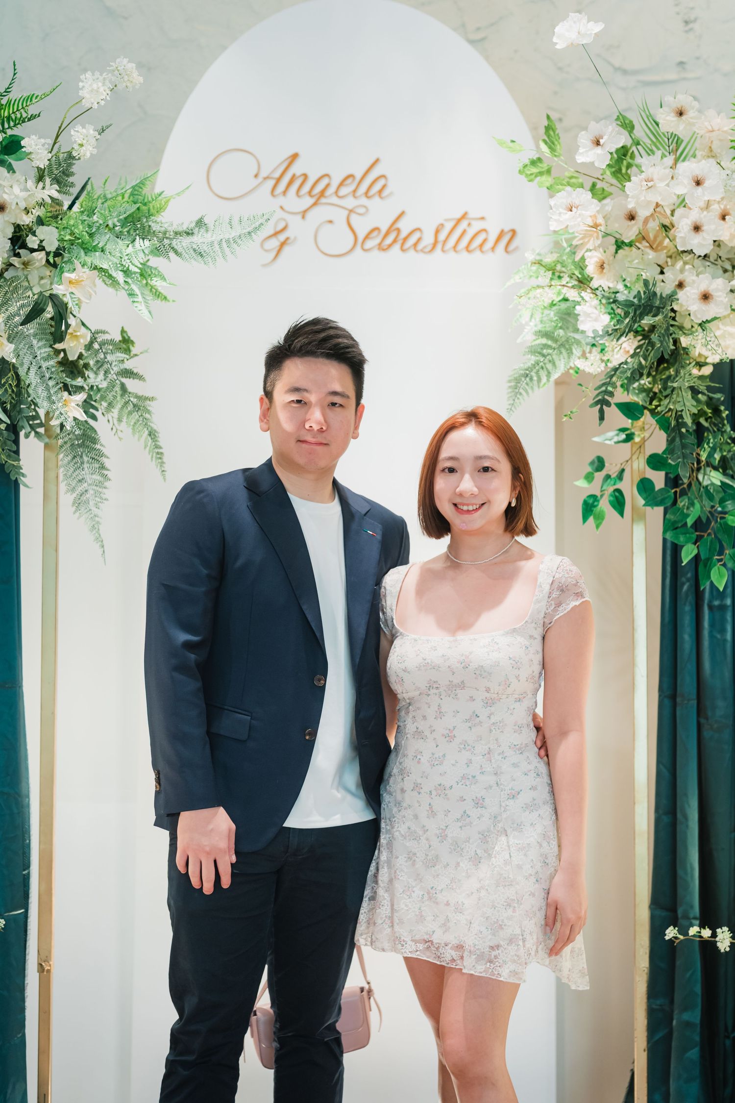 A collage of wedding photos featuring a couple at a ceremony space decorated with greenery and white floral arrangements.