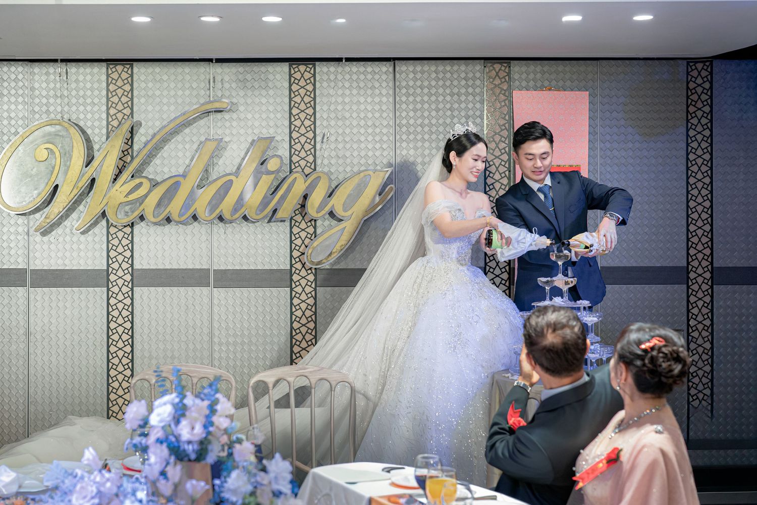 A collage of wedding reception moments showing dancing, decorations, and celebration in an elegant indoor venue.