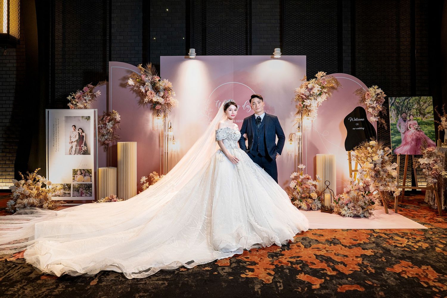 A stunning wedding ceremony setup with elegant floral arrangements and soft lighting creating a romantic atmosphere.
