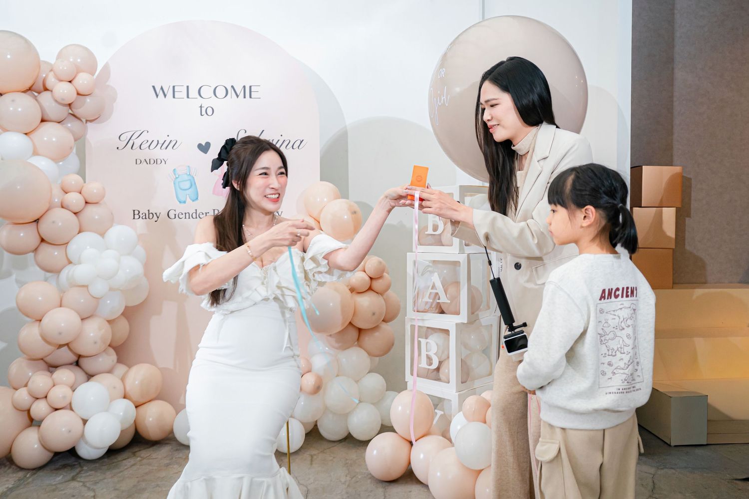 A series of romantic wedding photos with blush balloon decorations and elegant white gown details in a bright indoor setting.