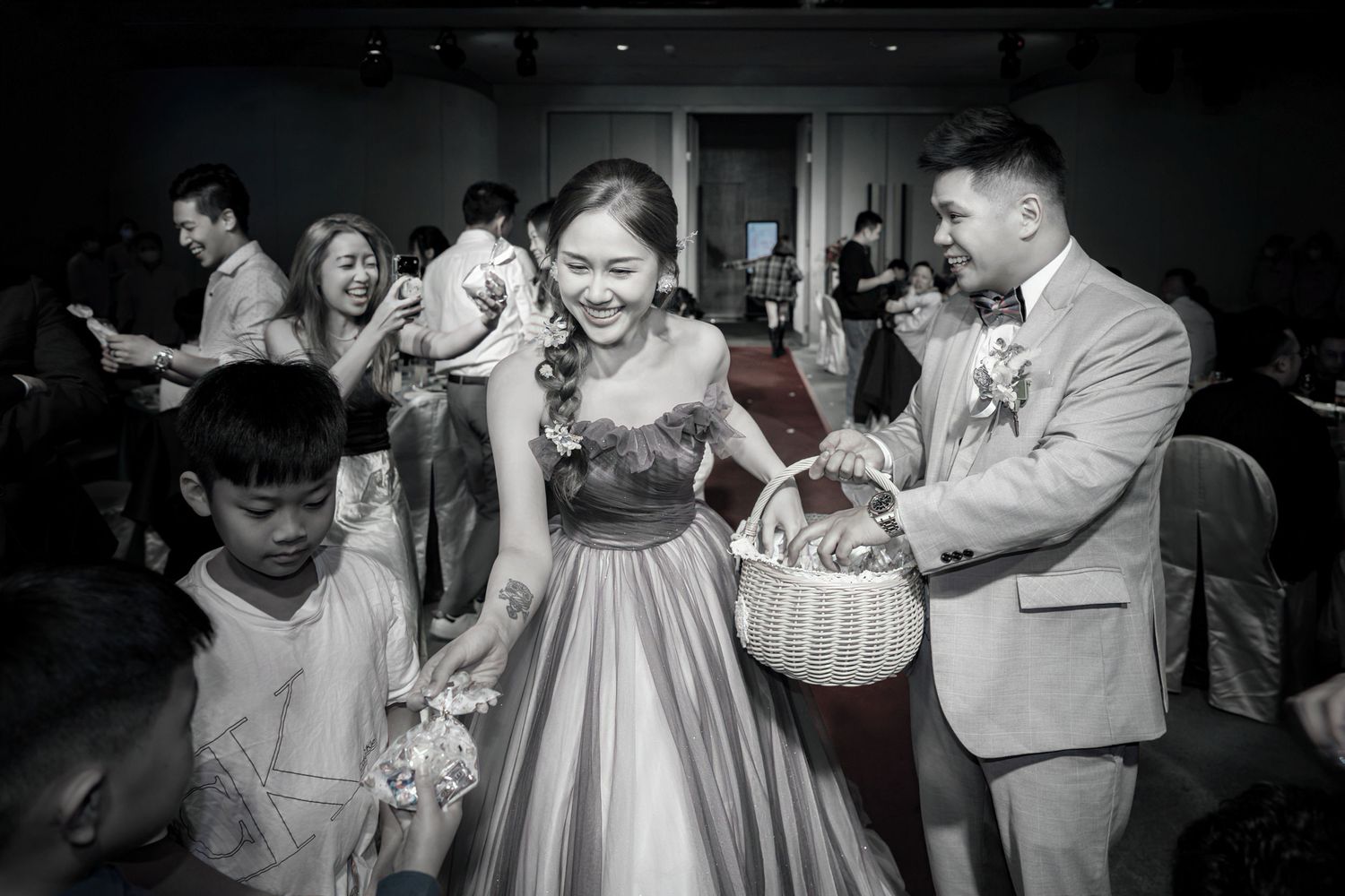 Black and white photo series showing joyful wedding reception moments of dancing and celebration on the dance floor.