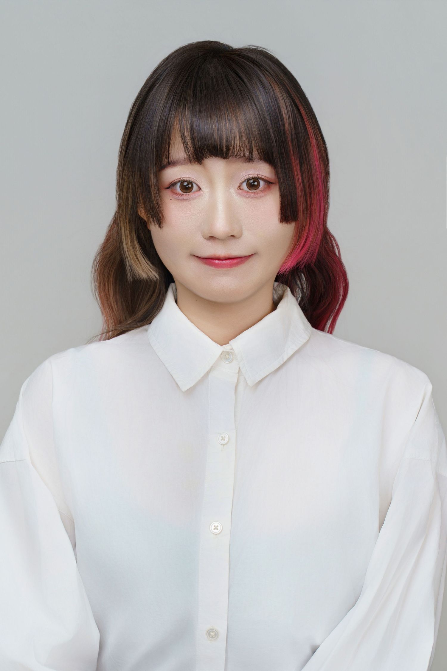 Person wearing a crisp white button-up shirt poses in a series of photos against a light gray background.