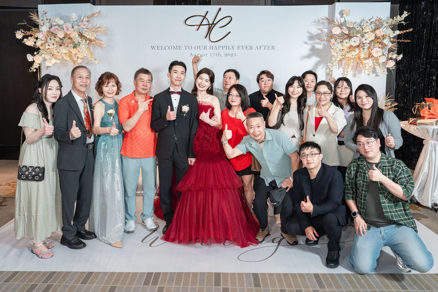 A group of formally dressed wedding guests and attendees posing together for photos in various indoor settings.