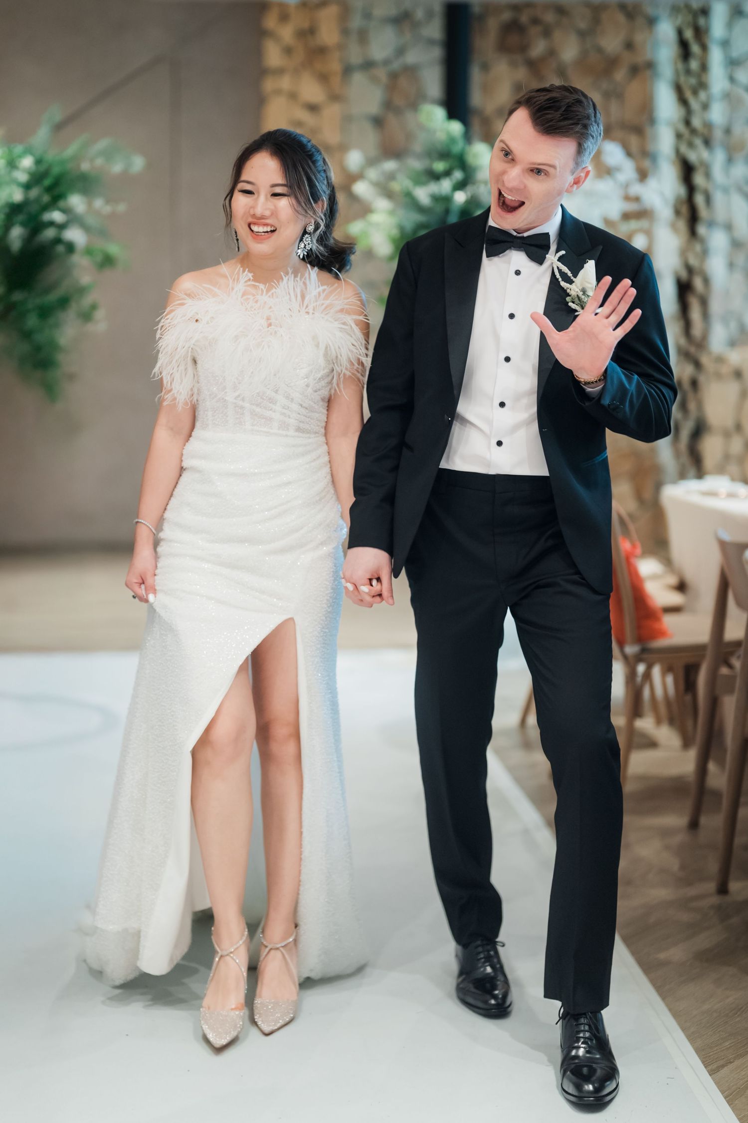 A couple poses in wedding attire showing off their footwear in a series of playful dance-like movements.