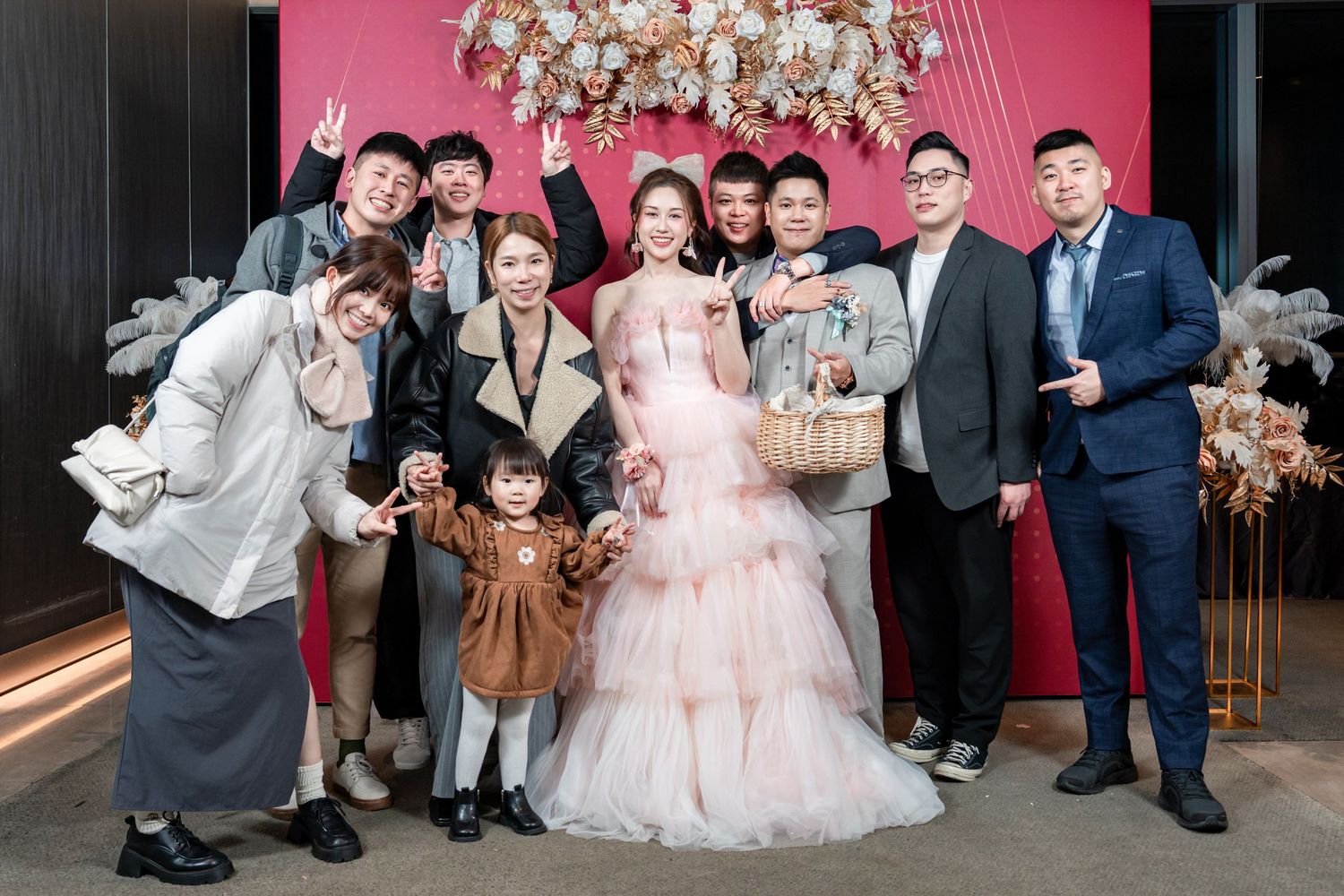 Wedding party poses together in a series of candid moments during a celebration.