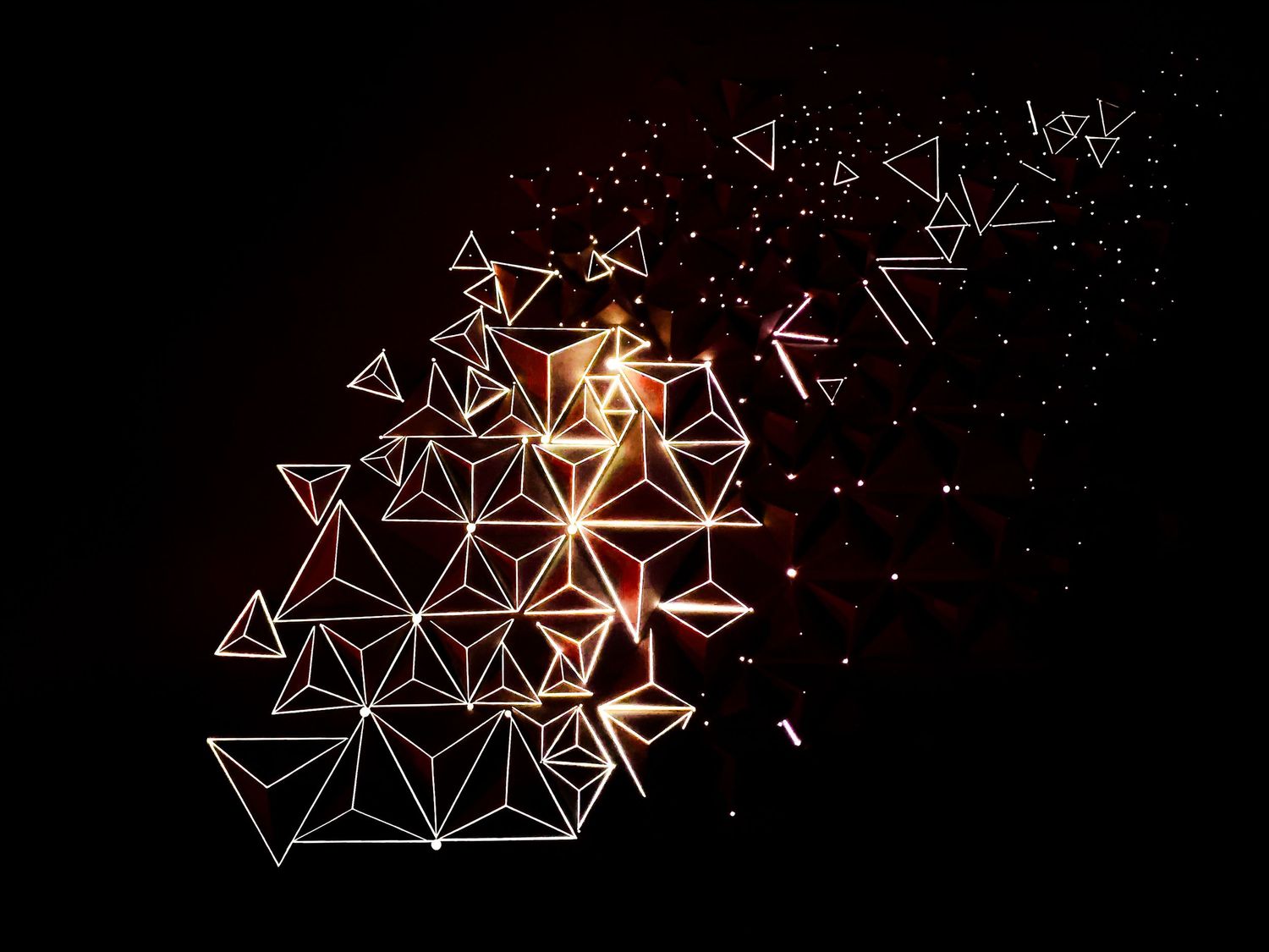Abstract digital art featuring glowing triangular shapes scattered across a dark background with orange light effects.