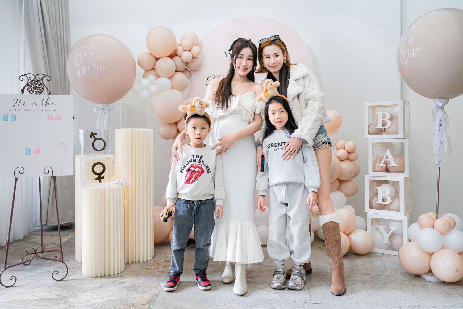 A collage of baby shower or nursery decorations featuring pink and peach balloons, floral arrangements, and vintage-style frames.