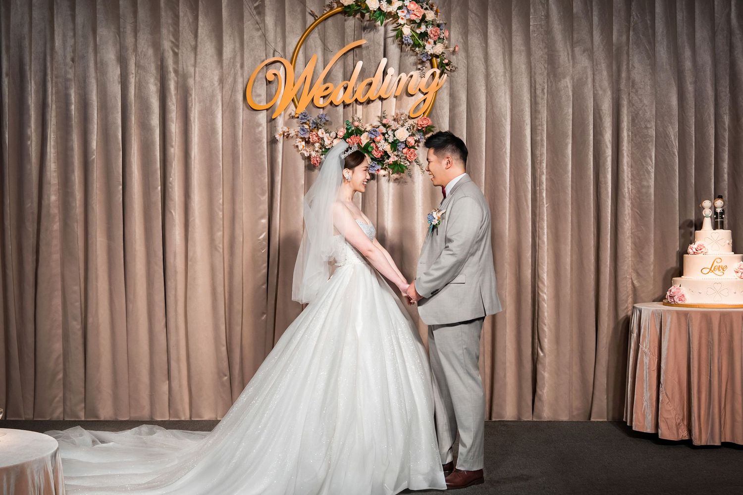 A wedding celebration montage showing elegant reception moments with couples dancing and a beautiful white wedding cake.