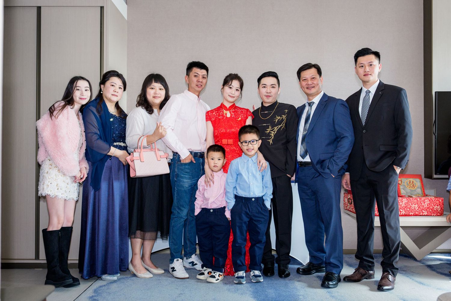 A panoramic collage of family photos showing multiple groups of people posing together in formal attire.