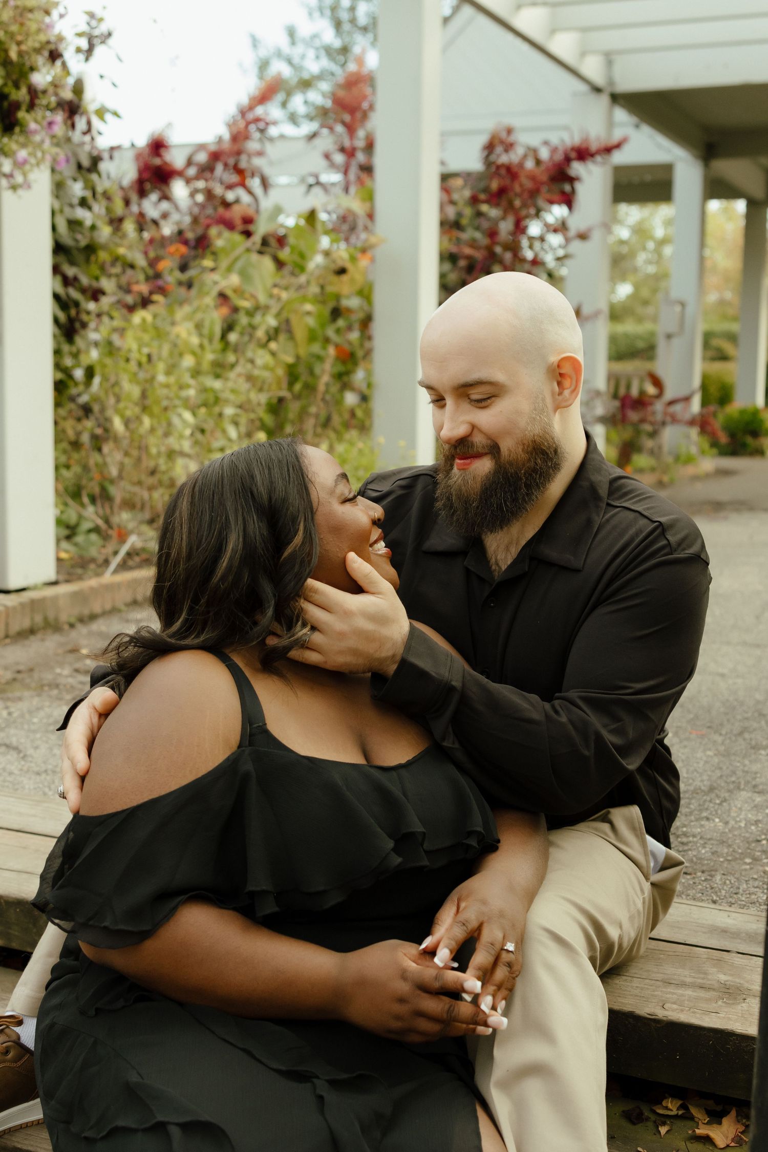 A couple shares intimate moments and laughter while sitting together outdoors in a series of candid photos.