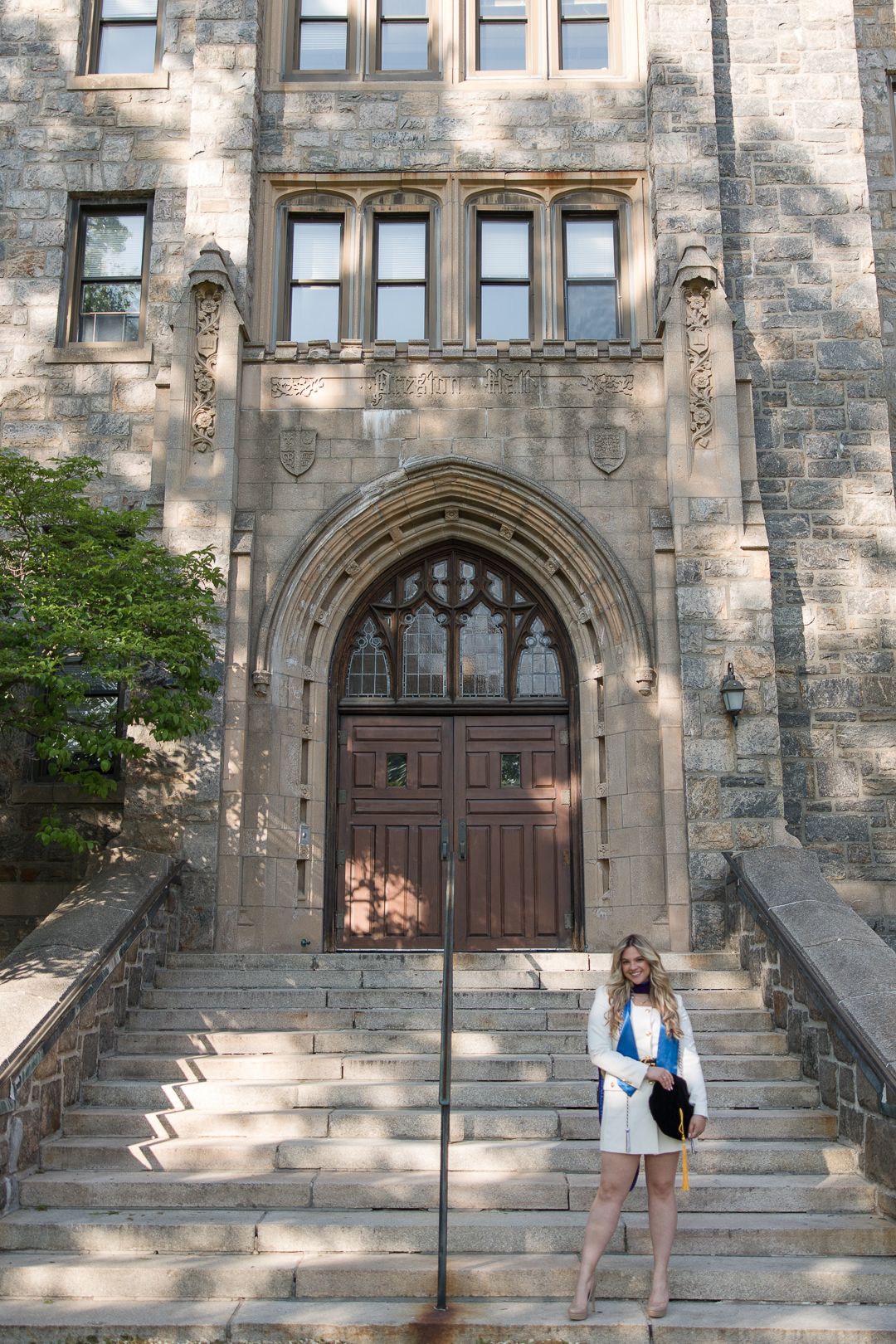 Gothic architecture building entrance with stone details and arched doorway.