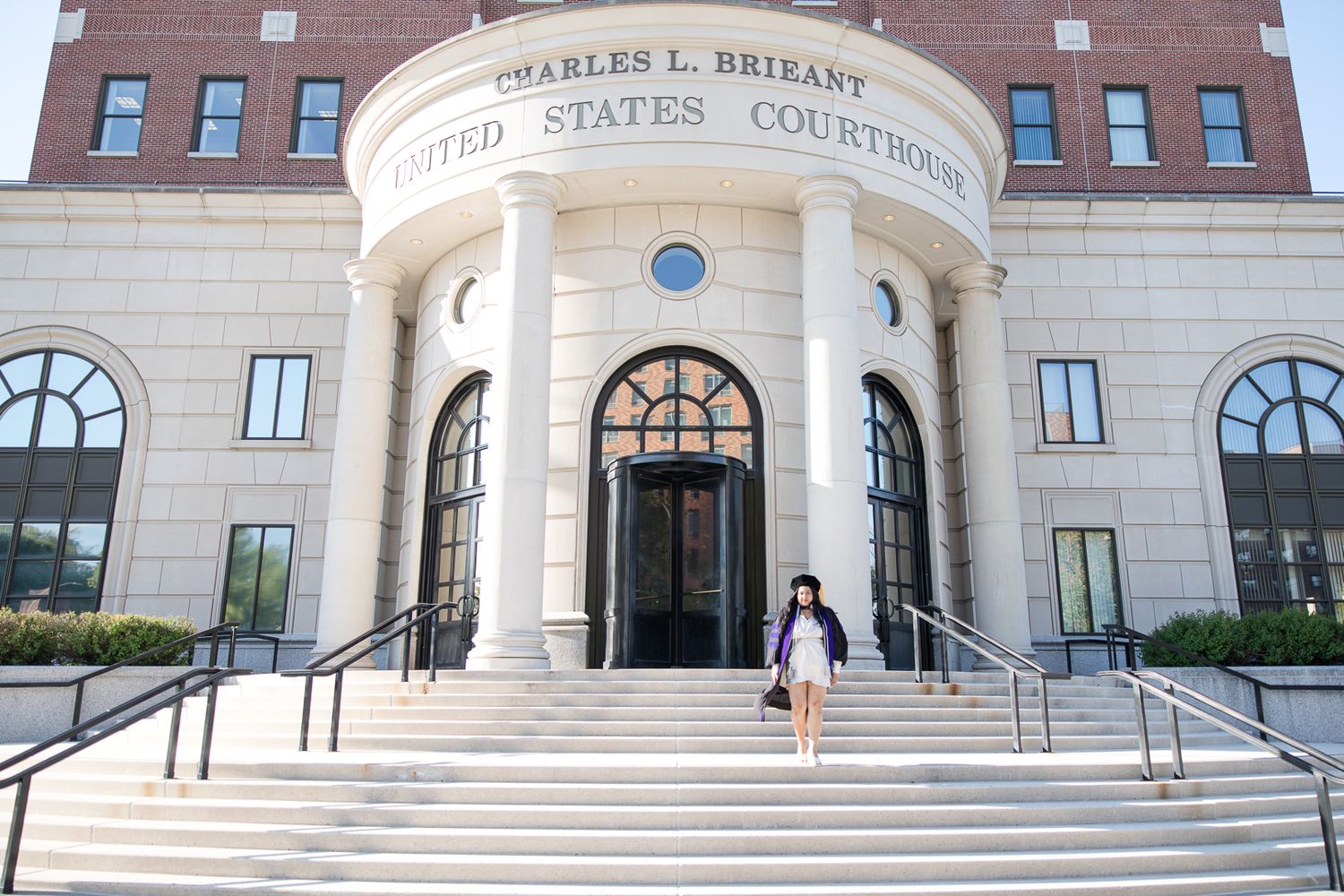 Front entrance of Charles L. Briant United States Courthouse featuring classical architecture and steps.